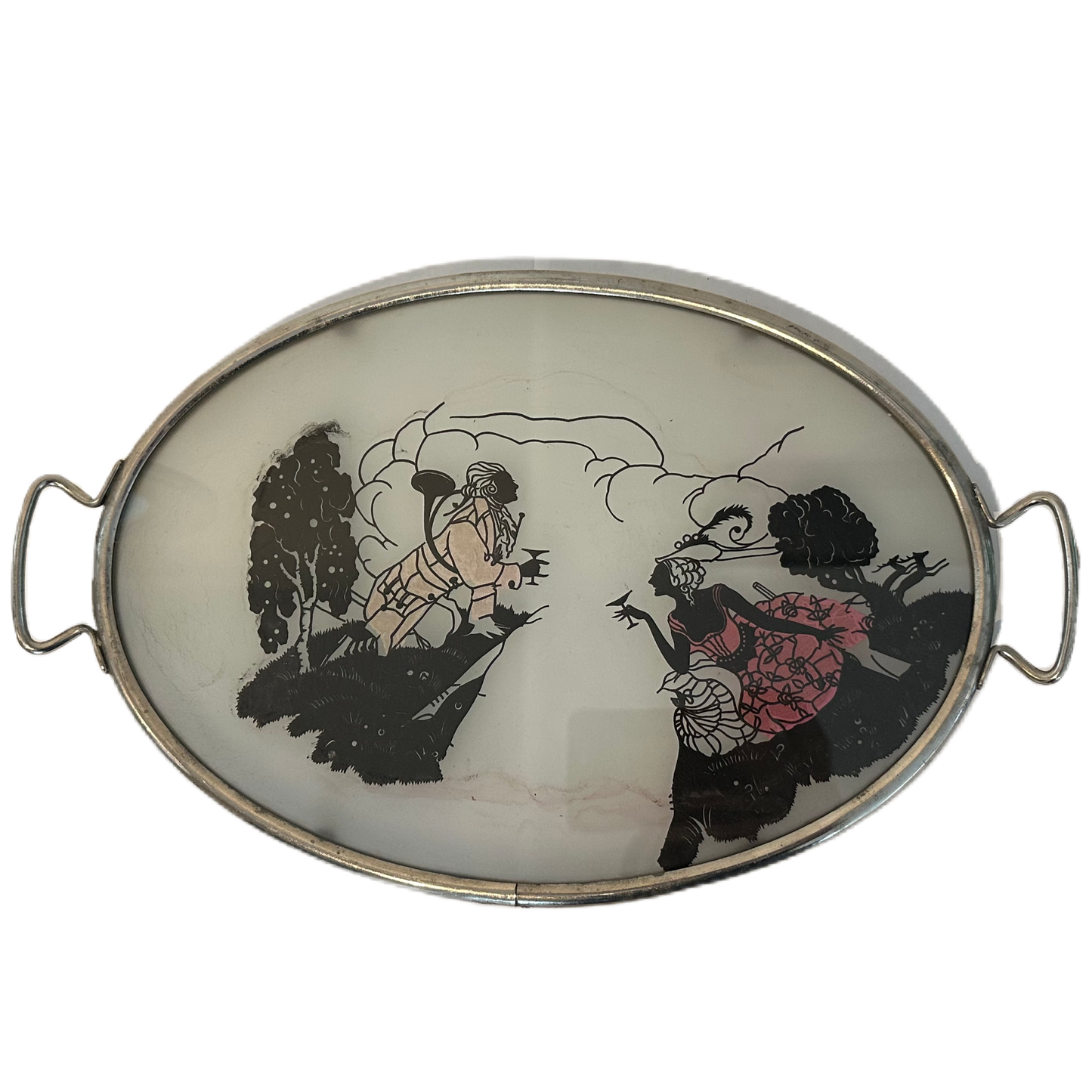 Oval, silverfärgad glasbricka med motiv.