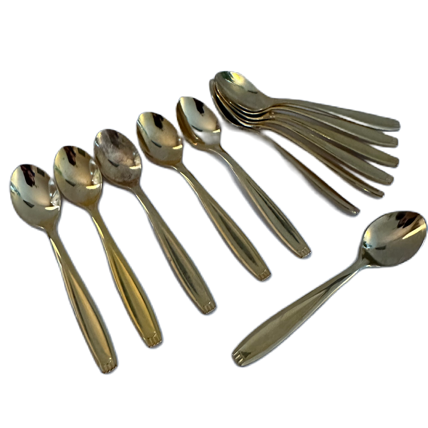 Tolv stycken guldfärgade, stilrena kaffeskedar.