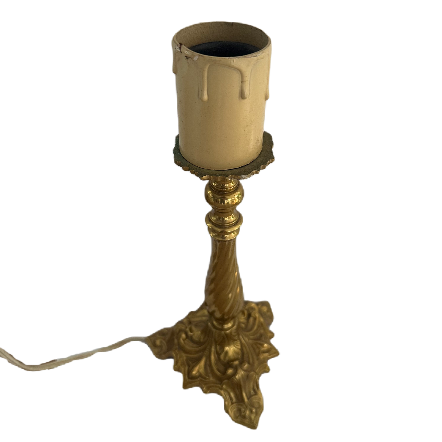 Lampfot i mässing med ljusimitationshylsa och mellanströmbrytare.