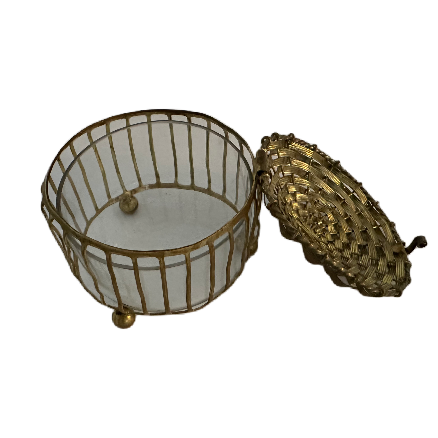 Lockask med fot i mässingsfärgat metallhölje.