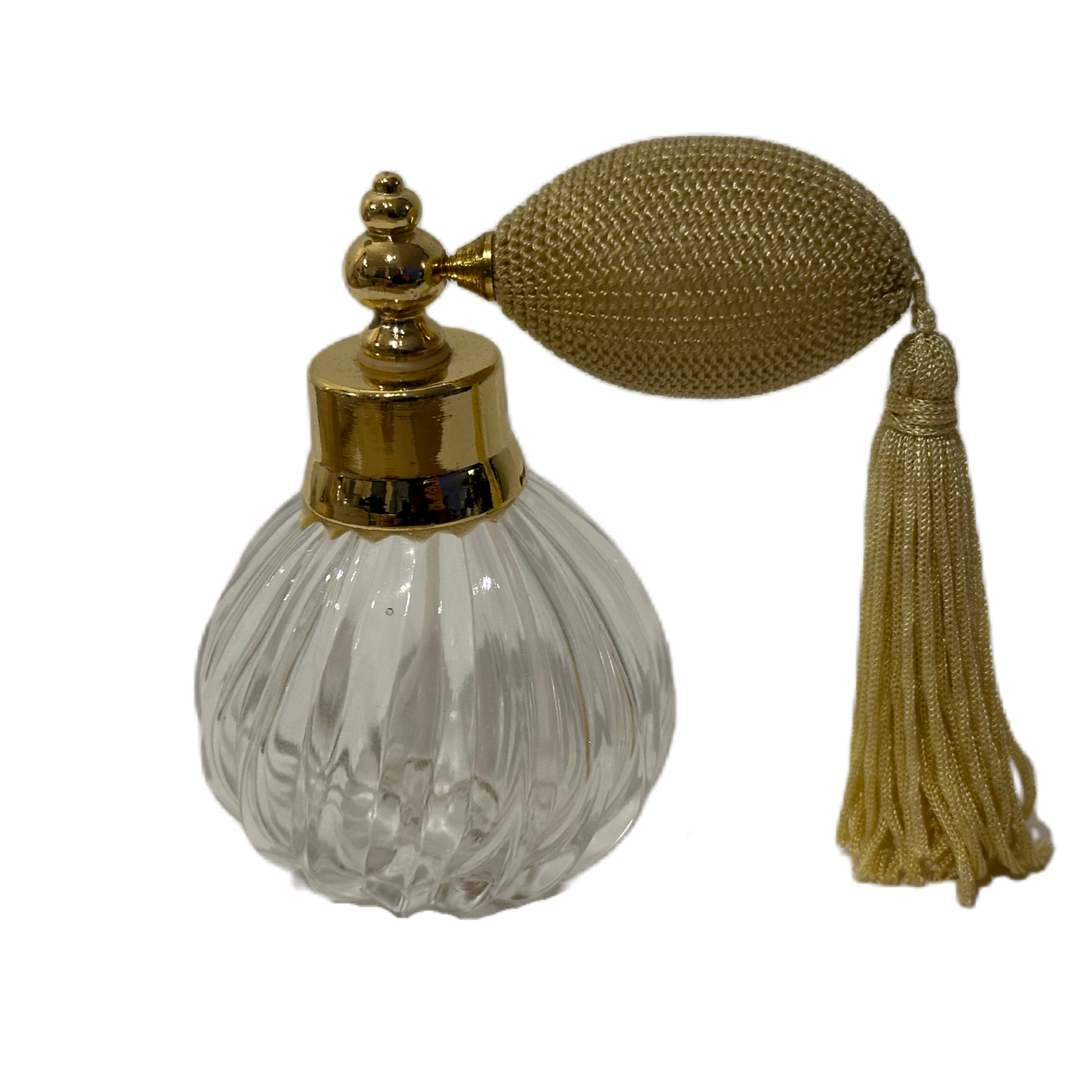 Parfymflaska i vridet glas med guldfärgad tassel samt pump med textilöverdrag från Lisbeth Dahl.