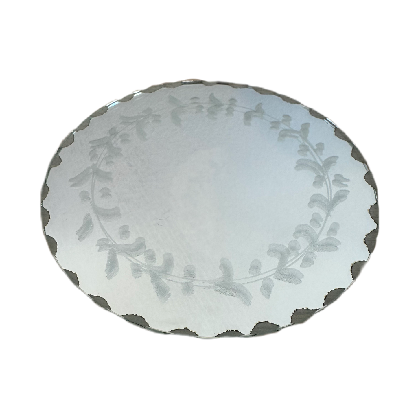 Underlägg i spegelglas med etsad ekor.