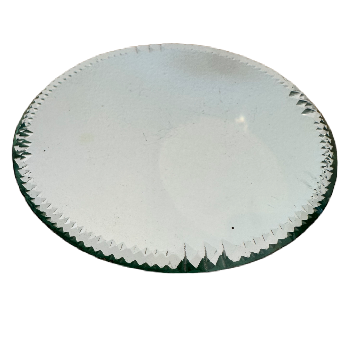 Underlägg med slipad dekor i spegelglas.