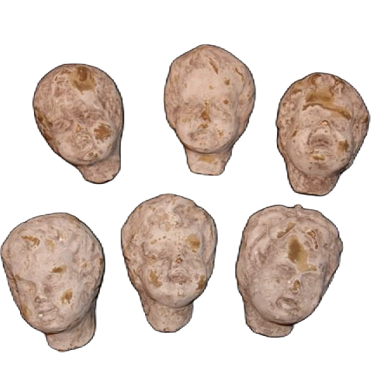 Väggdekorationer föreställandes grå huvuden av änglar från Filipiniana.