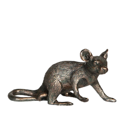 Gyllenbrun dekoration från A lot Decoration föreställandes en sittande mus.