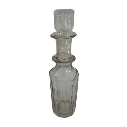 Liten flakong i glas med stilren design.