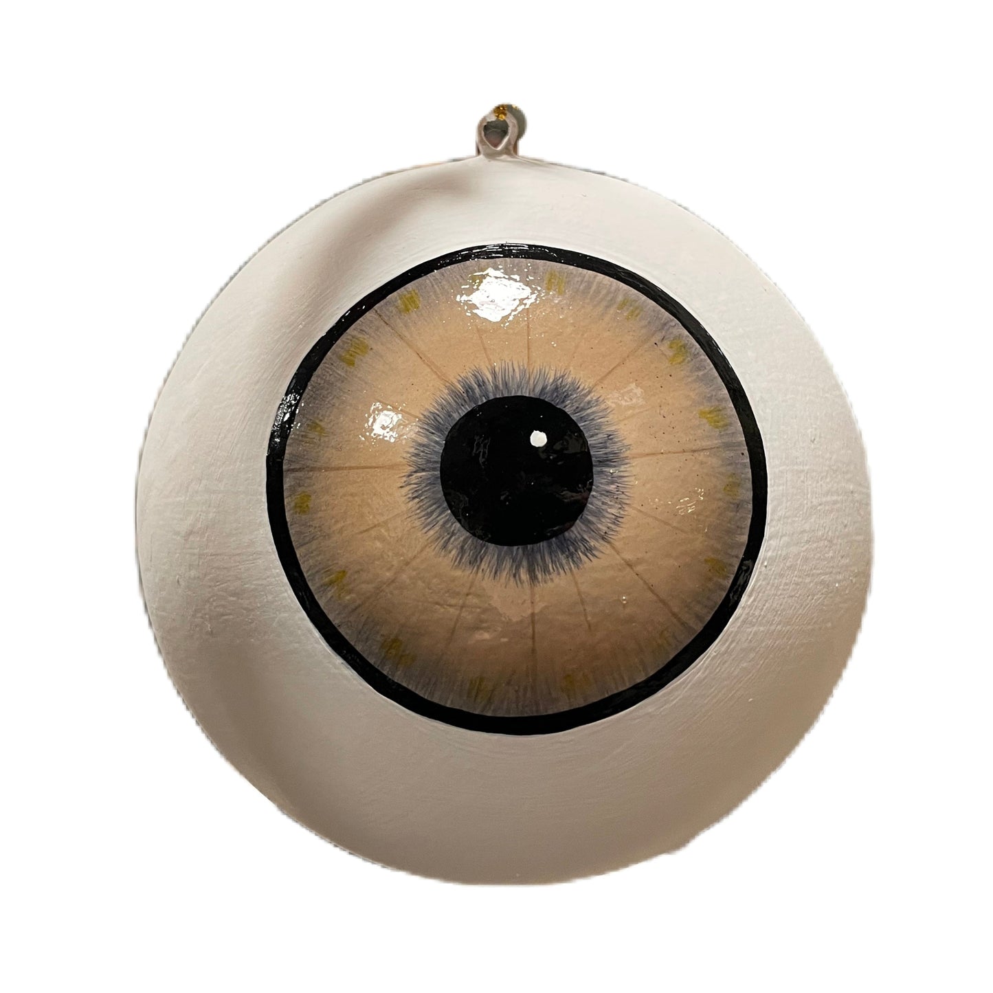 Hängdekoration från Filipiniana i form av ett stort öga med brun iris.