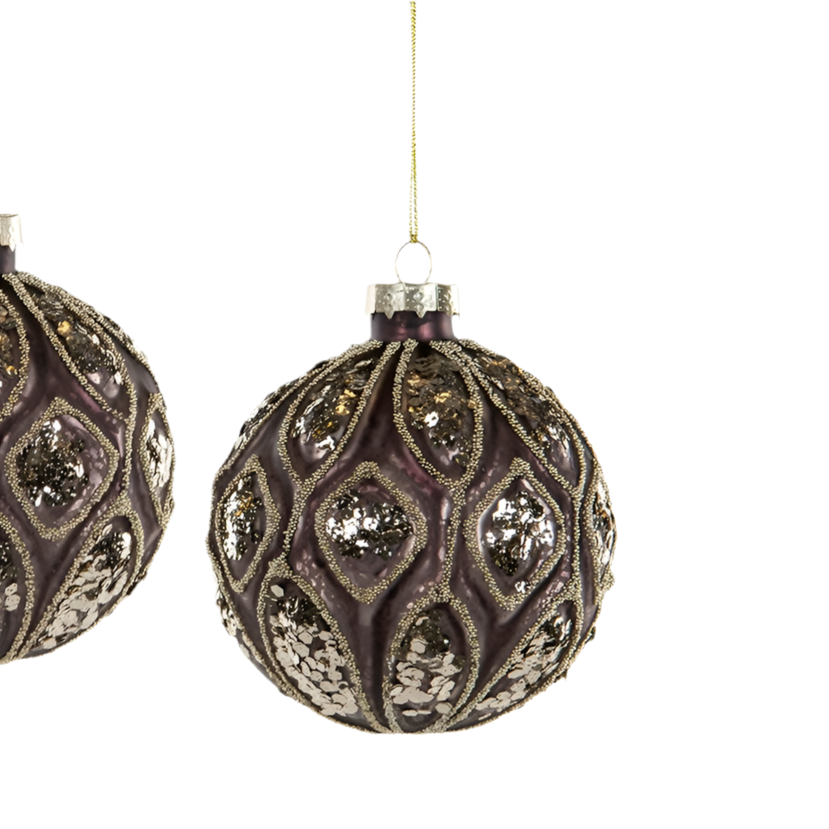 En klassisk julkula av glas i färgen mullvad med dekor av silvrigt glitter från A lot Decoration. 