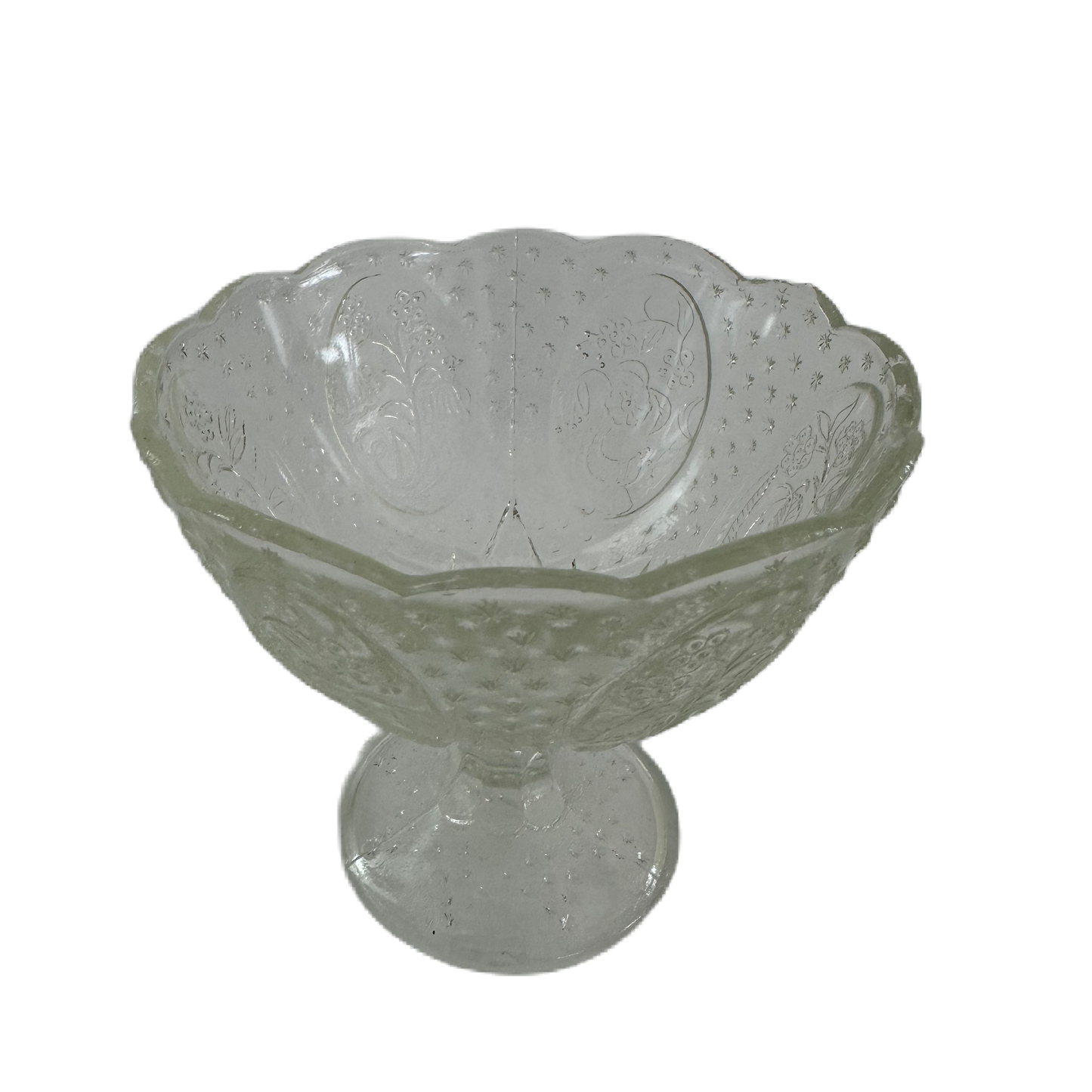 Liten mönstrad glasskål på fot.