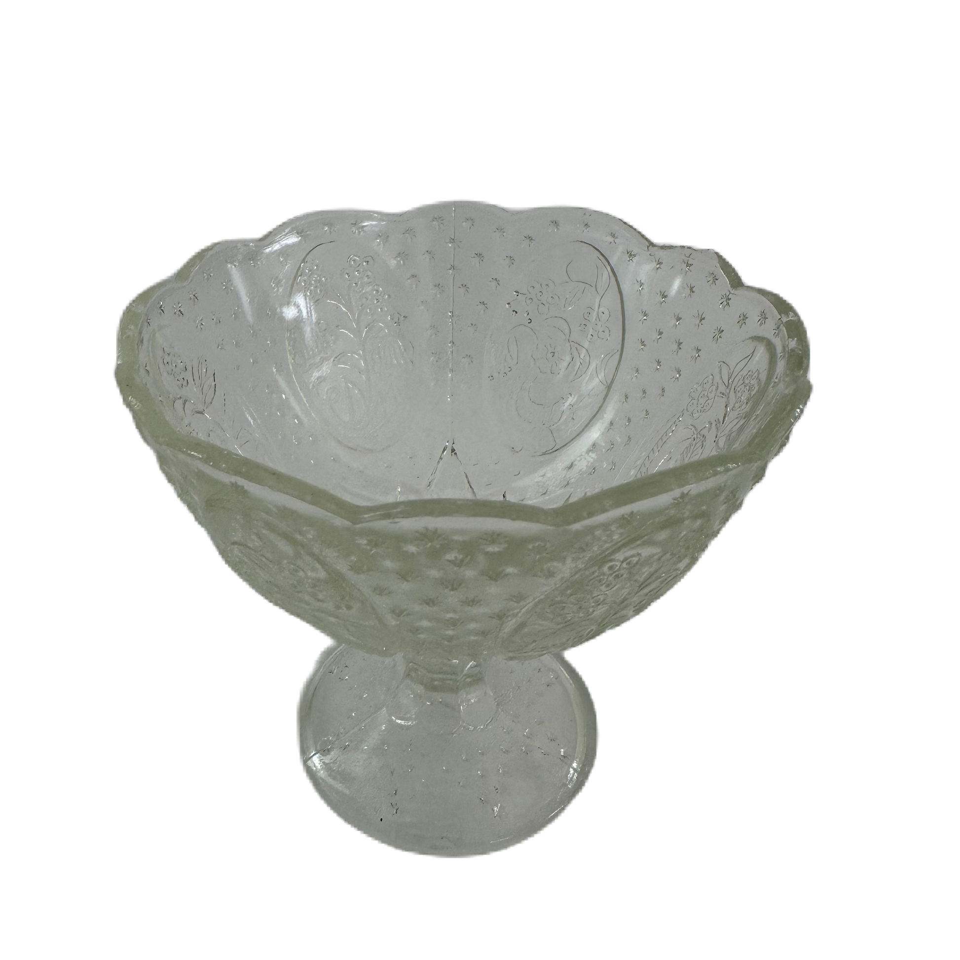 Liten mönstrad glasskål på fot.