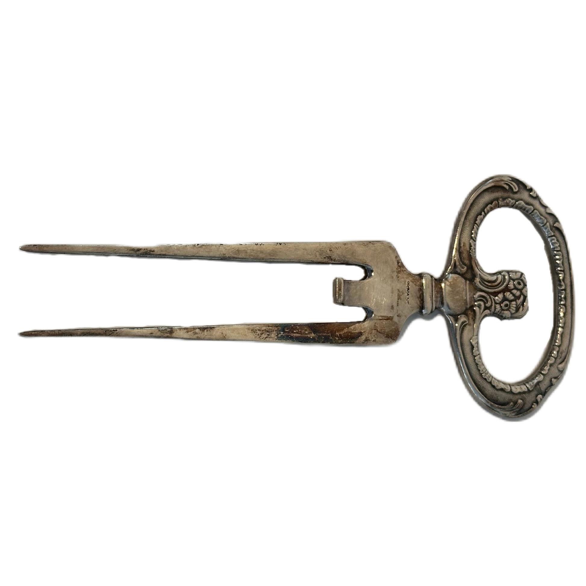 Mönstrad skinkgaffel i nysilver.