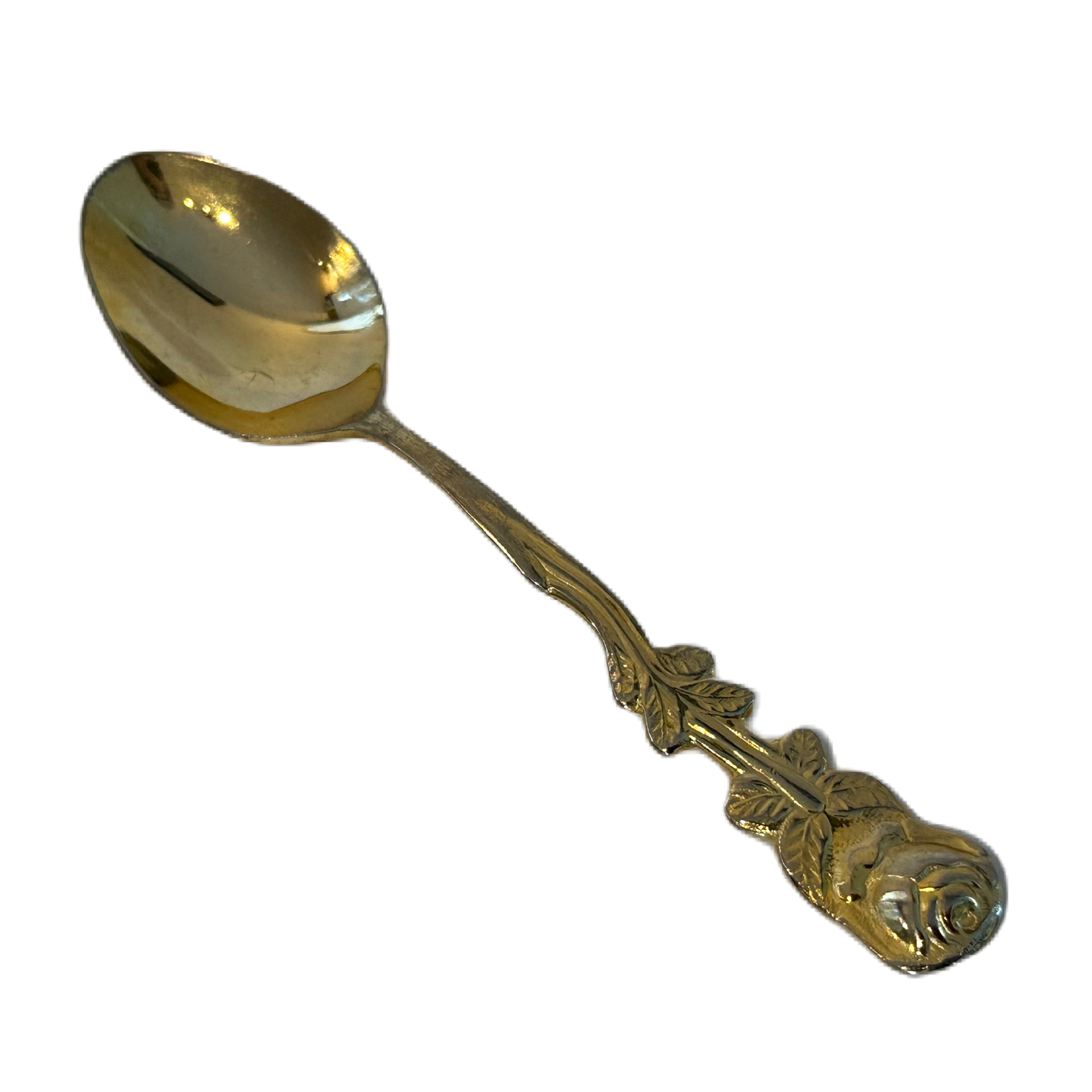 Guldfärgad tesked i rostfritt stål med dekorativ utsmyckning, föreställandes en ros.