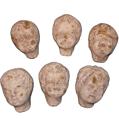 Väggdekorationer föreställandes grå huvuden av änglar från Filipiniana.