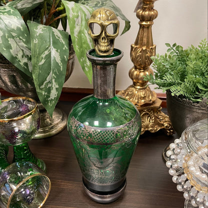 Vinstoppare från Filipiniana i mässingsfärgad metall, formad som en dödskalle.