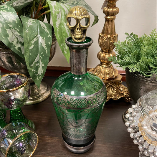 Vinstoppare från Filipiniana i mässingsfärgad metall, formad som en dödskalle.