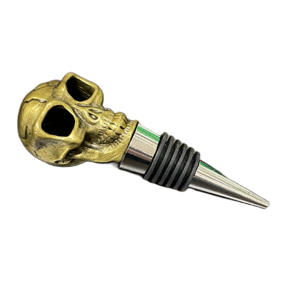 Vinstoppare från Filipiniana i mässingsfärgad metall, formad som en dödskalle.